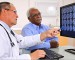 doctor-and-patient-looking-at-scans